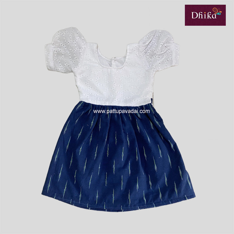 A navy blue and white striped frock with short sleeves and a flared skirt, displayed against a white background.