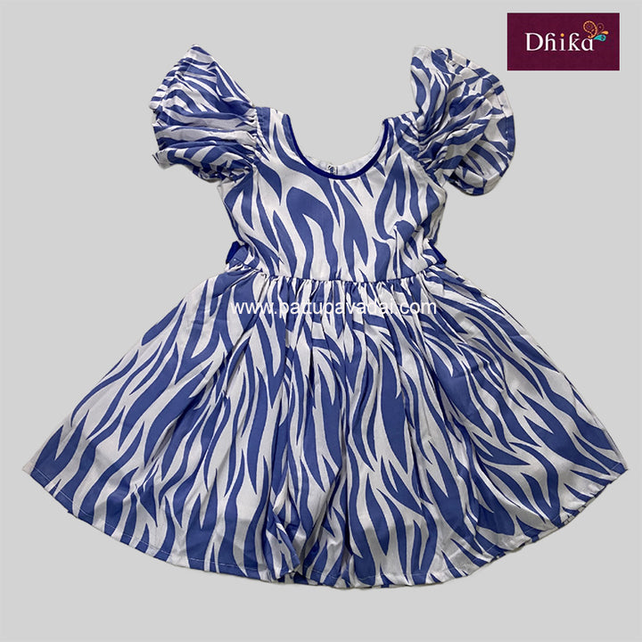 A traditional purple georgette frock with a zebra-like pattern, displayed against a white background.