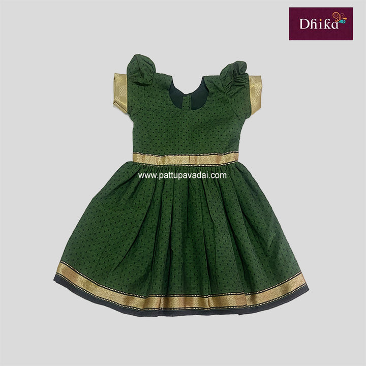 A leaf green colored cotton frock with short puffed sleeves, a round neckline, and a golden border at the hem and sleeves.