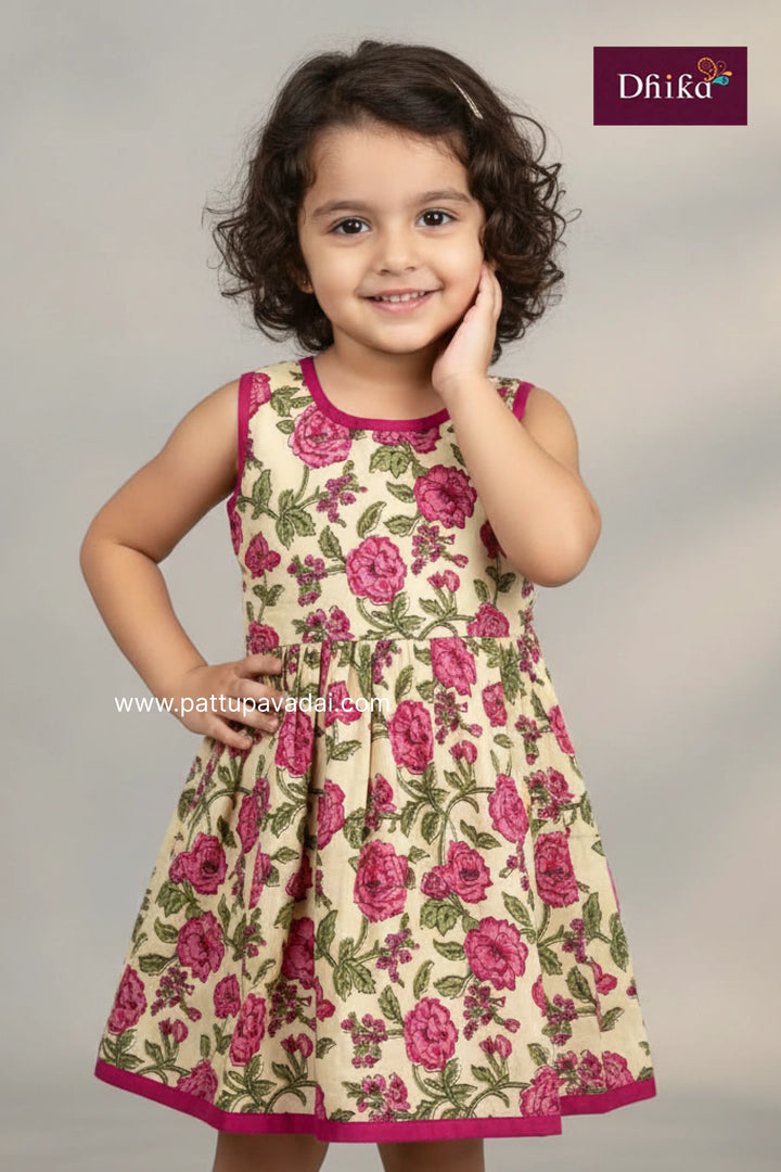 Young girl wearing a floral dress with pink roses on a gray background, featuring the Dkfd brand.