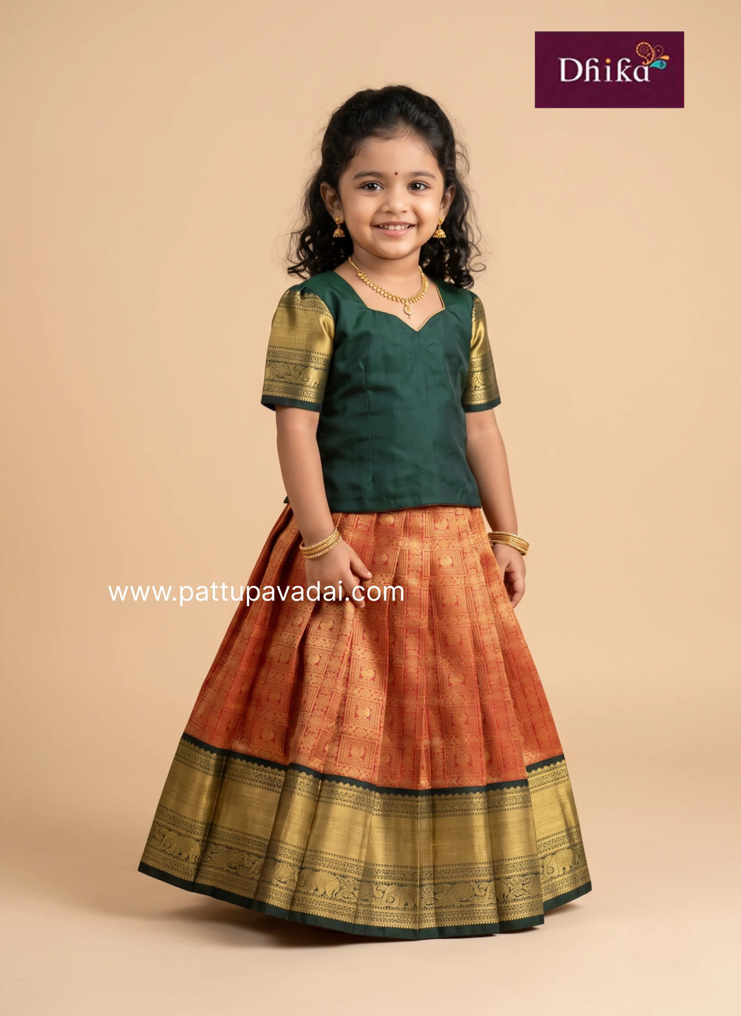 dark green and red silk pattu pavadai showing the contrasting colours