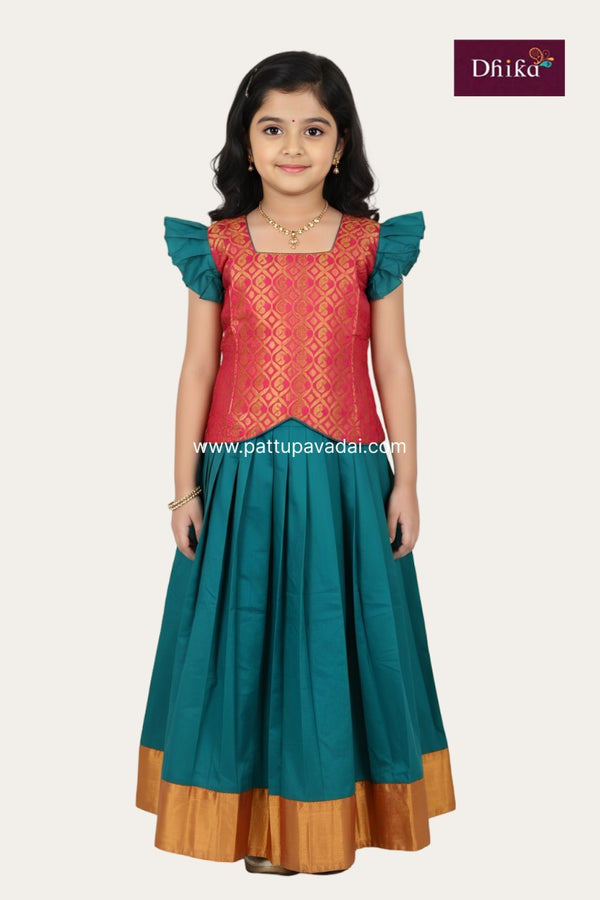Young girl wearing a traditional outfit with red and green colors on a white background