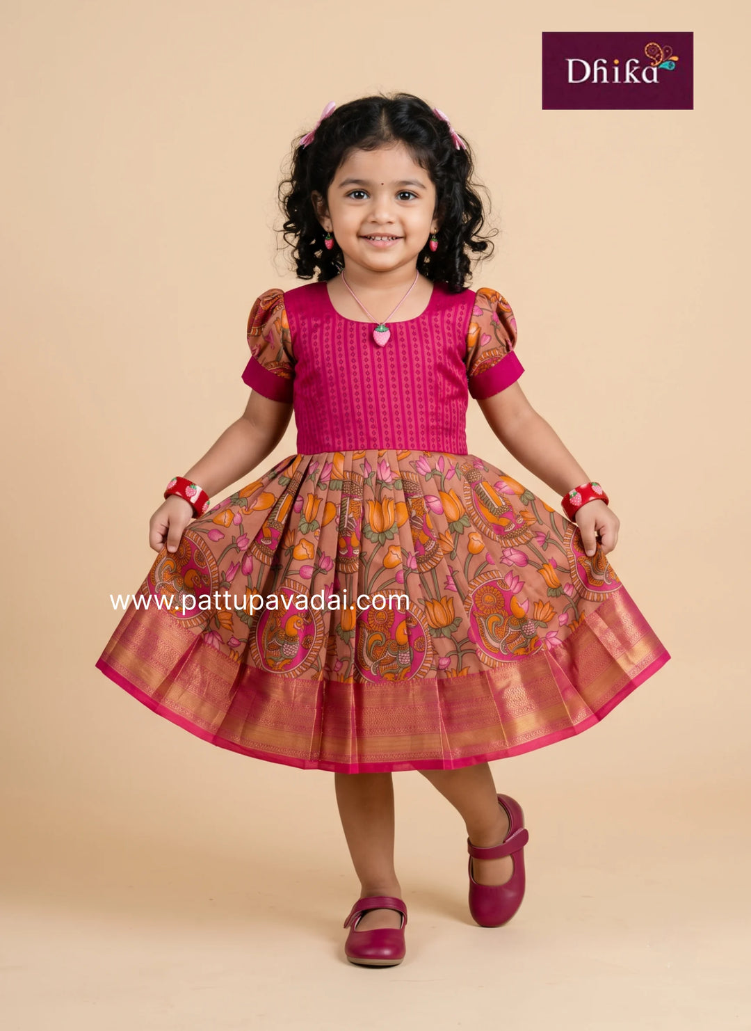 pink kids frock styled for a birthday party