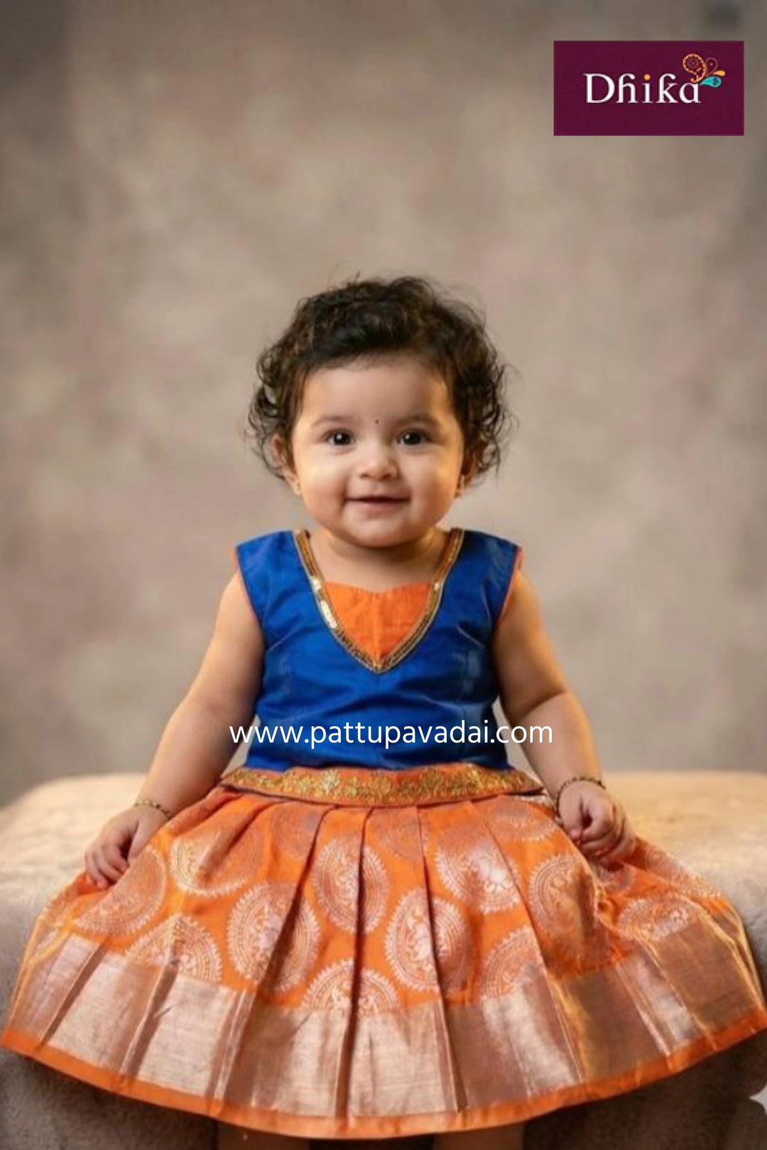 pure silk pavadai blue and orange with silver zari buttas and puff sleeve blouse for kids