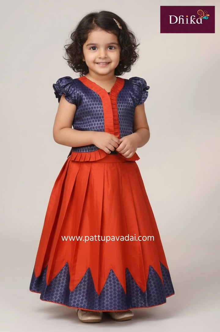 orange and navy blue semi silk pattu pavadai set overcoat style blouse for kids festive wear