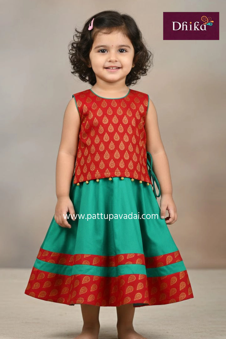 sleeveless green and red chanderi langa brocade kids festive wear with cotton lining from pattupavadai.com