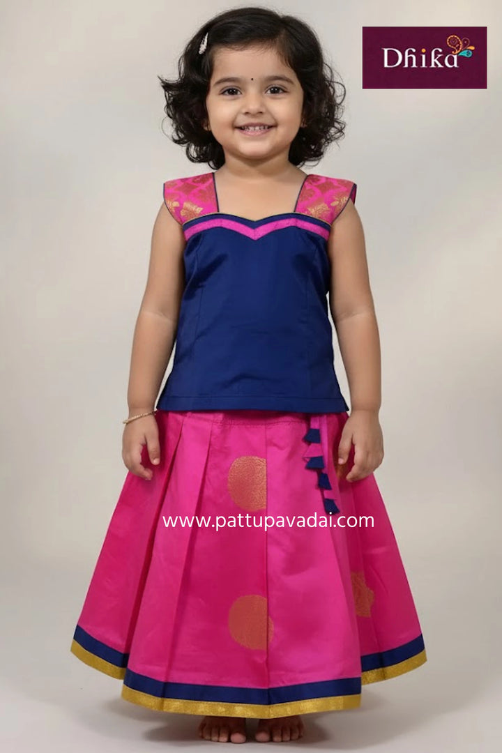 soft silk pavadai light pink and navy blue with big zari buttas and sleeveless blouse for kids
