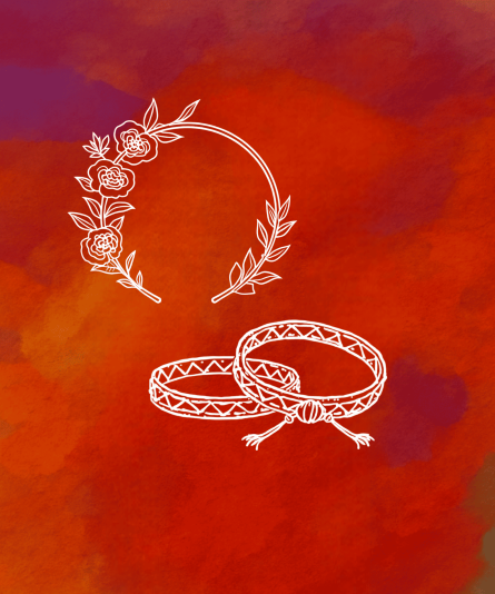 White wedding rings with floral design on a red and orange watercolor background