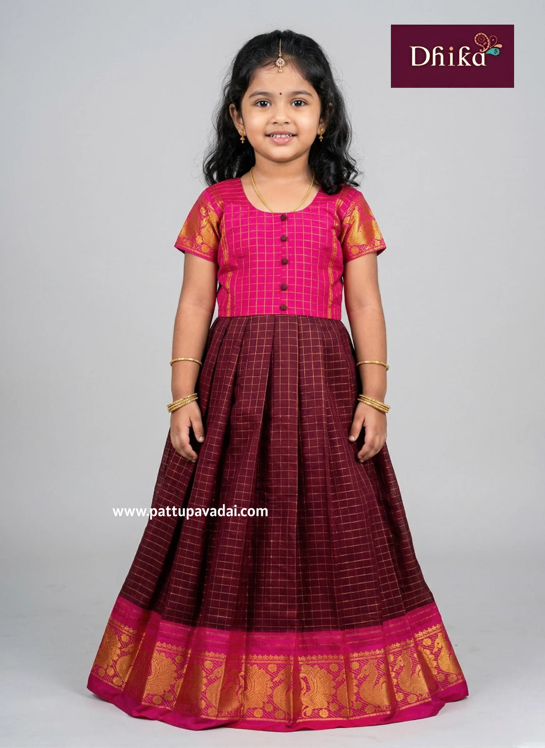 Brown and pink checked cotton long gown for girls traditional pattu pavadai style dress with gold border