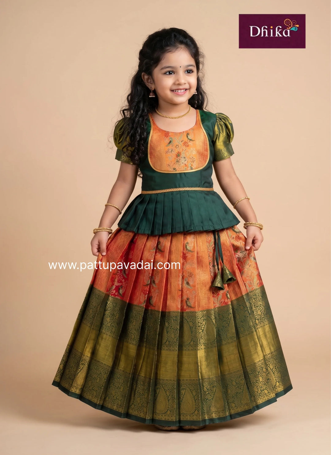 orange and green Semi Kanchi Pattu pavadai for girls front view