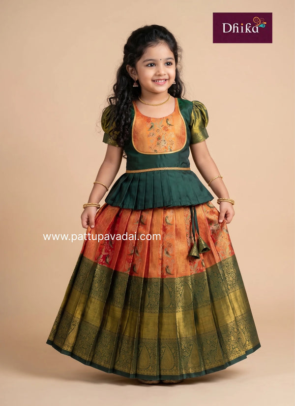 orange and green Semi Kanchi Pattu pavadai for girls front view