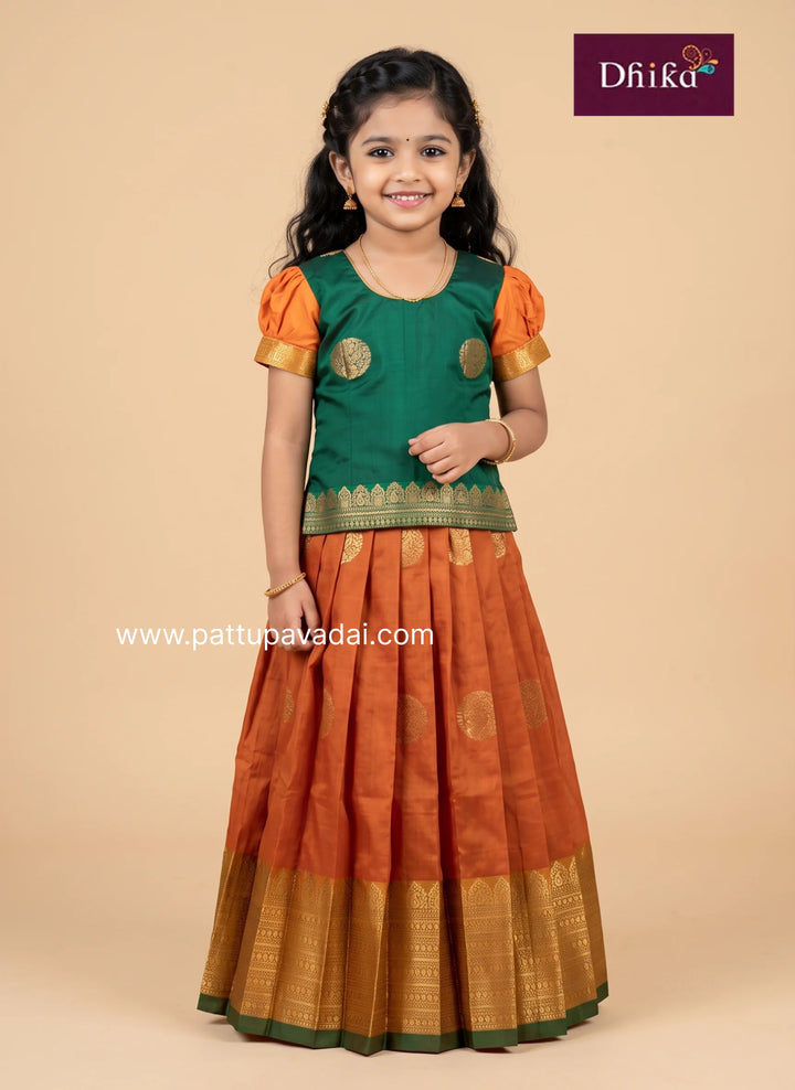 orange and green soft silk pavadai for girls