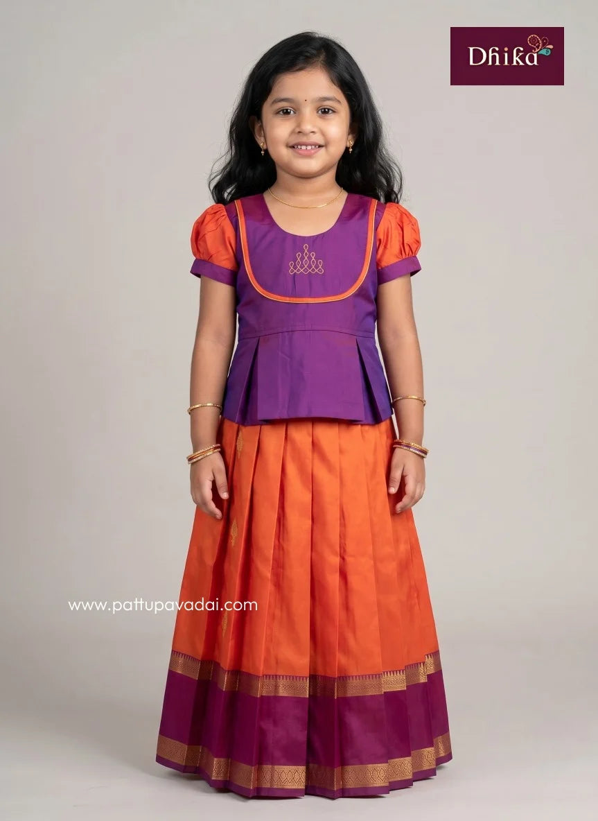 orange and magenta soft silk pavadai for girls front view