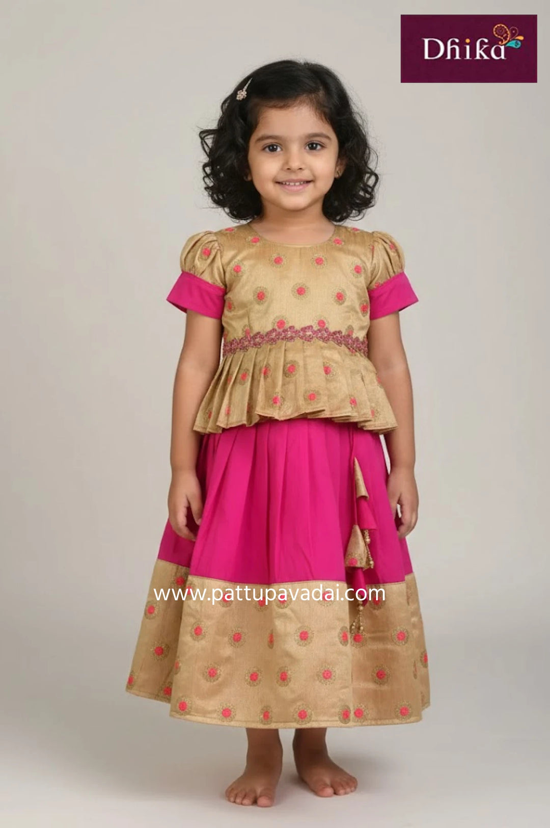 pink and cream raw silk pavadai sattai for kids with embroidery work tassels and soft cotton lining