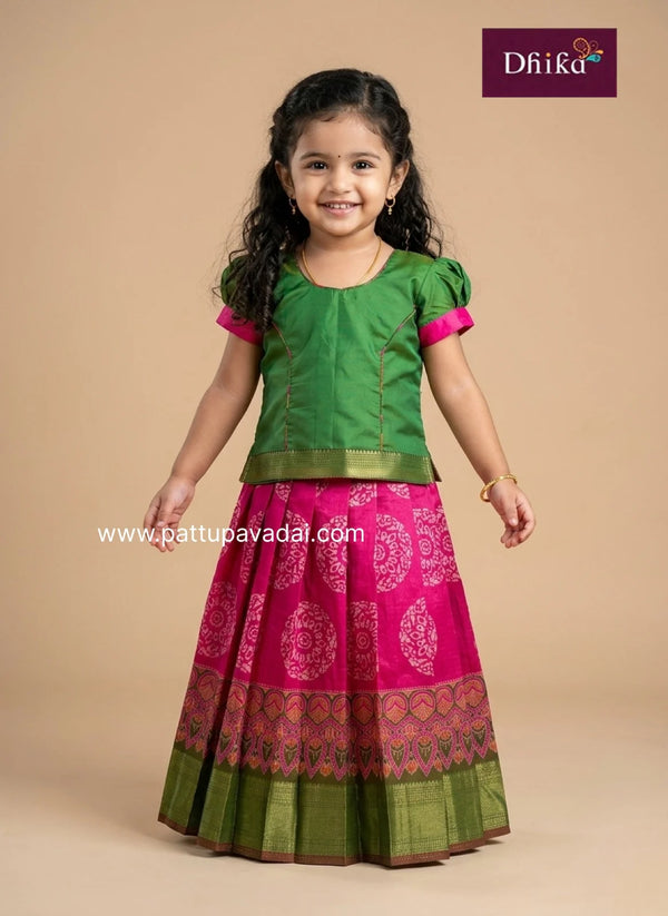 pink and green pattu pavadai for girls traditional silk kids dress