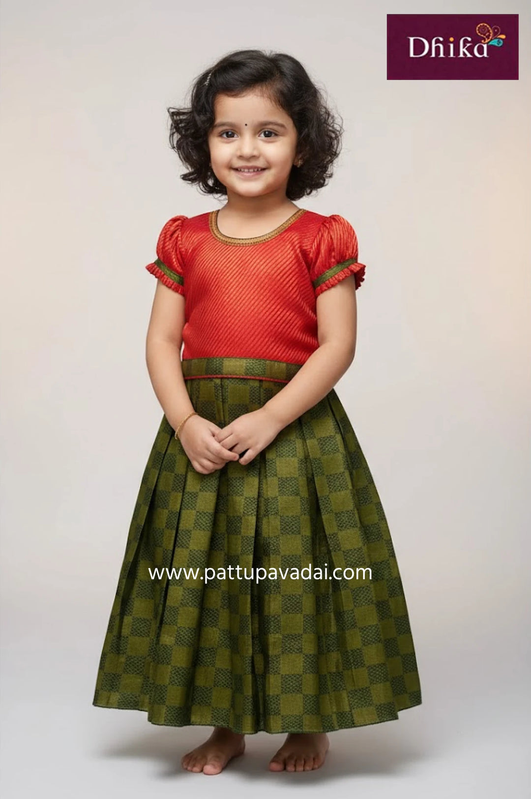 red and green brocade pattu pavadai for kids with box pattern skirt puff sleeve blouse and cotton lining