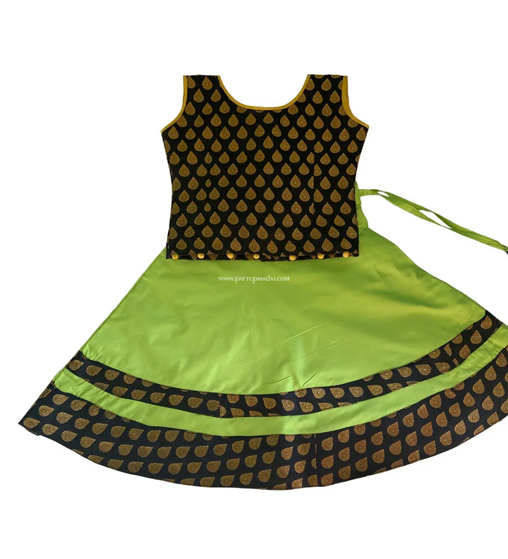 Sleeveless parrot green and black Chanderi langa for girls with brocade border festive wear